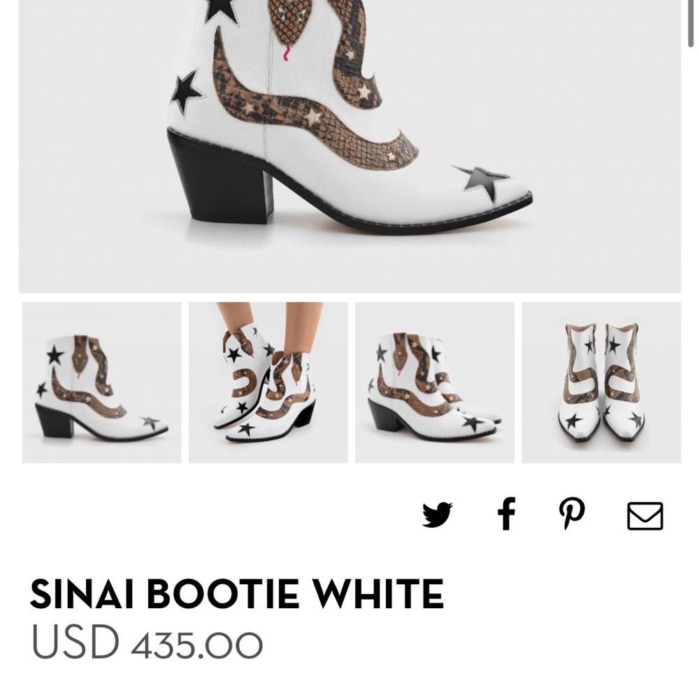 Very cool white boots from a Peruvian designer. Only used once